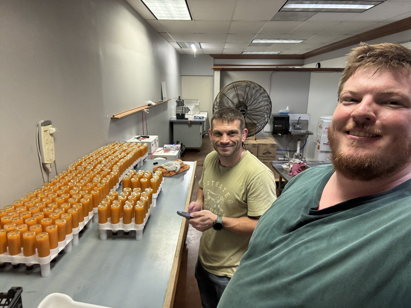 Matthew and Gabe with finished bottles